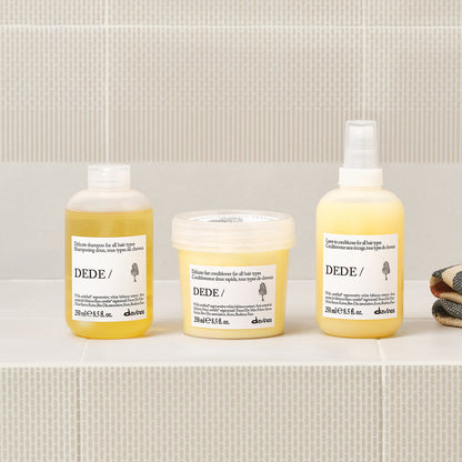 Davines DEDE Conditioner shown in a styled bathroom setting