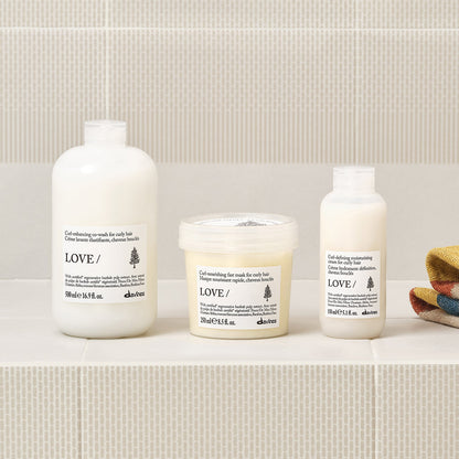 Lifestyle photo of Davines Love Curl Cream for curly hair