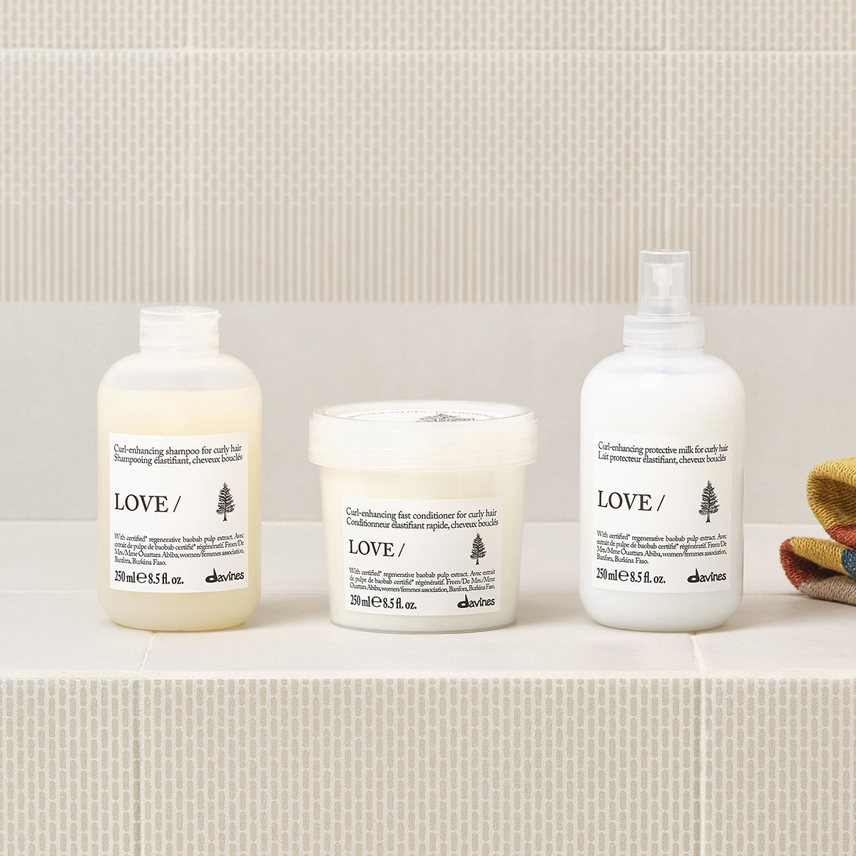 Lifestyle photo of Davines Love Curl Shampoo for curly hair