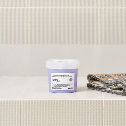 Lifestyle photo of Davines Love Smoothing Mask for frizzy hair