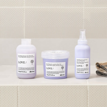 Lifestyle photo of Davines Love Smoothing Serum for frizzy hair