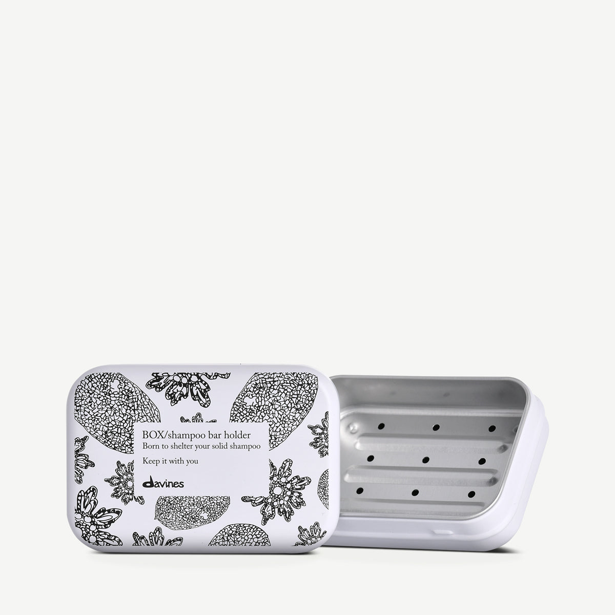 Reusable Davines aluminium shampoo bar tin, included with the with-tin option