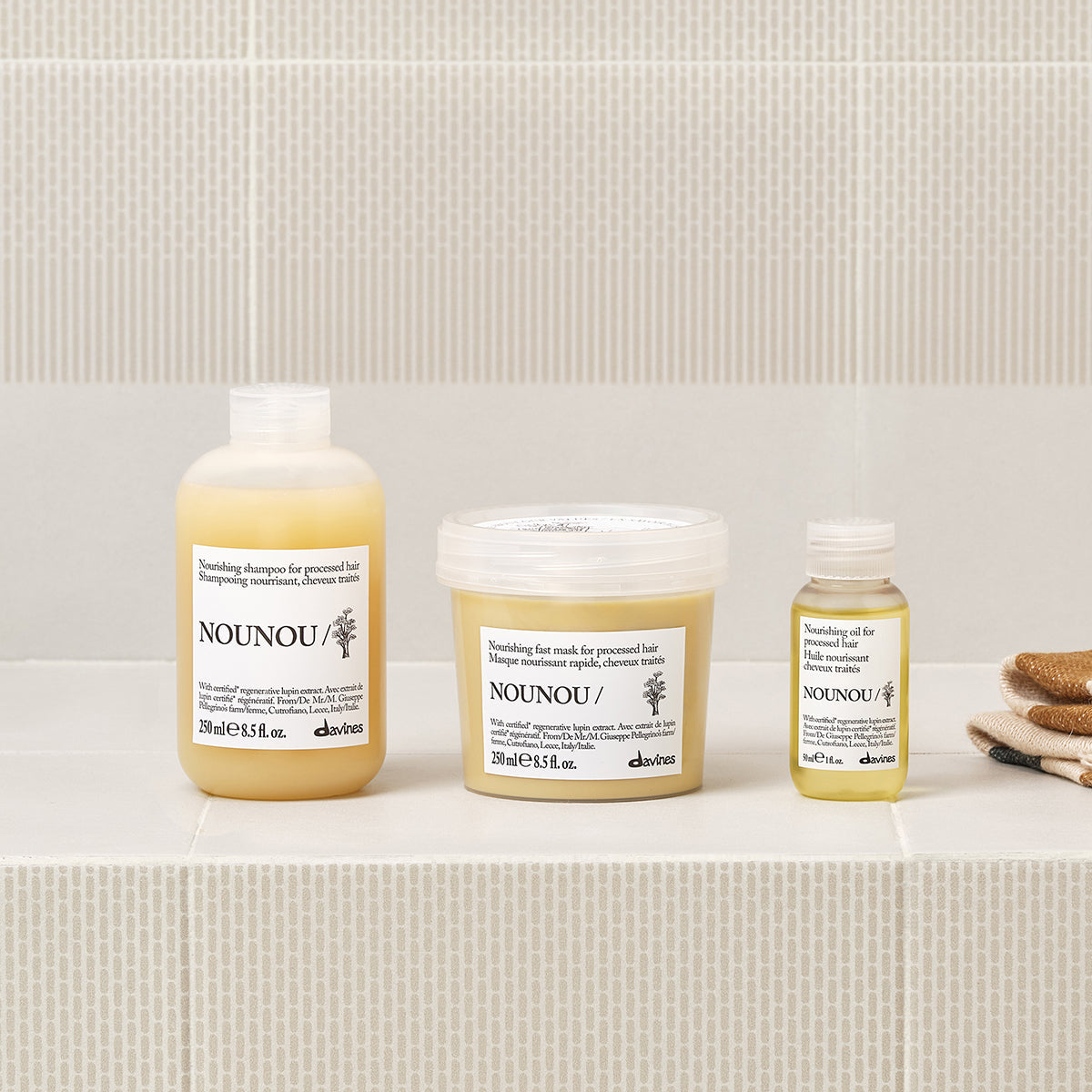 Lifestyle photo of Davines Nounou Shampoo for damaged hair