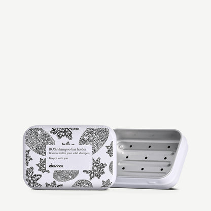 Reusable Davines aluminium shampoo bar tin, included with the with-tin option