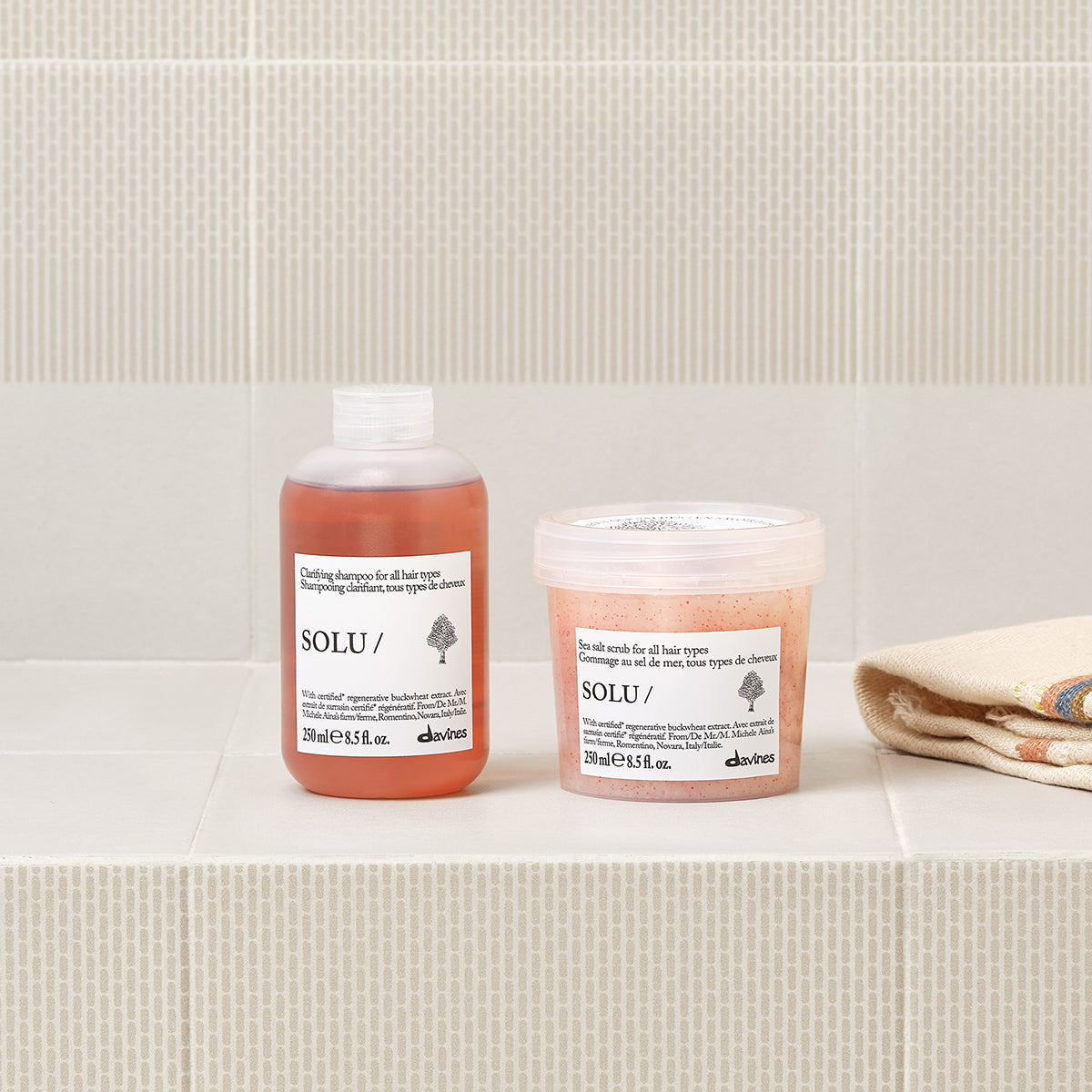 Lifestyle photo of Davines Solu Sea Salt Scrub, deep-cleansing scalp scrub
